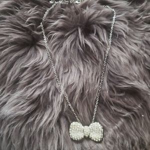 Spencers Small Crystal Rhinestone Bow Necklace